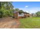 A cozy, brick home featuring a neat front yard and comfortable setting at 807 New St, Graham, NC 27253