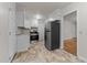 The kitchen is equipped with appliances and ample storage at 807 New St, Graham, NC 27253