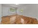 Spacious living area with hardwood floors and lots of natural light at 807 New St, Graham, NC 27253