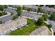 Overhead shot of townhomes with parking and landscaping provides community perspective at 818 Bryant St, Raleigh, NC 27603