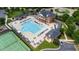 Expansive community pool with tennis courts and ample lounging space for residents to enjoy at 818 Bryant St, Raleigh, NC 27603