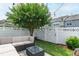 Cozy backyard with patio furniture, a well-maintained lawn, and a privacy fence for outdoor enjoyment at 818 Bryant St, Raleigh, NC 27603