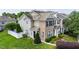 Charming townhome featuring brick accents, manicured lawn, and lush landscaping for a welcoming curb appeal at 818 Bryant St, Raleigh, NC 27603