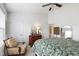 Cozy bedroom with a ceiling fan, green accent wall, and lots of natural light at 818 Bryant St, Raleigh, NC 27603