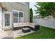A cozy patio features comfortable seating and string lights, perfect for outdoor relaxation at 818 Bryant St, Raleigh, NC 27603