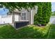 A well-maintained patio offers a private outdoor space with lush greenery and a seating area at 818 Bryant St, Raleigh, NC 27603