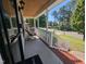 Inviting covered front porch offers a relaxing outdoor seating area at 908 E Hudson Ave, Durham, NC 27704