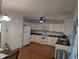 Functional kitchen with white cabinets, appliances, and plenty of counter space at 908 E Hudson Ave, Durham, NC 27704