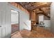 Attic with exposed framework and insulation, next to a finished bonus room space at 9508 Waterwood Ct, Raleigh, NC 27614