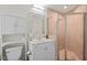 Bathroom featuring a vanity, toilet, and tiled shower with glass enclosure at 9508 Waterwood Ct, Raleigh, NC 27614