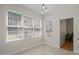 Breakfast nook with large windows providing ample natural light and serene views at 9508 Waterwood Ct, Raleigh, NC 27614