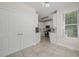 Cozy breakfast nook adjacent to the kitchen with large windows at 9508 Waterwood Ct, Raleigh, NC 27614