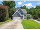 Charming two-story home with well-maintained lawn and inviting curb appeal at 9508 Waterwood Ct, Raleigh, NC 27614