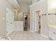 Bathroom featuring walk-in shower with glass surround, double closets and tile flooring at 1005 Fairfax Woods Dr, Apex, NC 27502