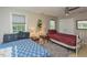 Bright bedroom featuring two beds and neutral decor at 1005 Fairfax Woods Dr, Apex, NC 27502