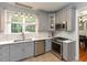 Beautiful kitchen with stainless steel appliances, stone countertops, and modern fixtures at 1005 Fairfax Woods Dr, Apex, NC 27502