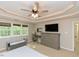 Comfortable main bedroom featuring natural light, desk and cozy furnishings at 1005 Fairfax Woods Dr, Apex, NC 27502