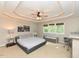 Spacious main bedroom with tray ceiling, fan, and plenty of natural light at 1005 Fairfax Woods Dr, Apex, NC 27502