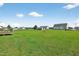 Expansive backyard with lush green grass and plenty of space for outdoor activities at 108 Hudson Dr, Princeton, NC 27569
