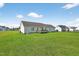 Well-maintained backyard featuring a deck, green lawn, and plenty of space at 108 Hudson Dr, Princeton, NC 27569