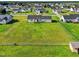 Aerial view showcases a huge fenced backyard, providing privacy and space in a serene residential neighborhood at 108 Hudson Dr, Princeton, NC 27569
