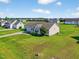 Charming single-story home with a well-maintained lawn and attached two-car garage in a peaceful neighborhood at 108 Hudson Dr, Princeton, NC 27569