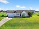 Charming single-story home with a well-maintained lawn and inviting curb appeal at 108 Hudson Dr, Princeton, NC 27569