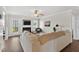 Spacious living room features a fireplace, and back door to a sunroom at 108 Hudson Dr, Princeton, NC 27569