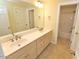 Bright bathroom featuring double sinks, tile floors, and a separate shower at 1126 Falling River Walk, Rocky Mount, NC 27804