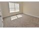 Carpeted bedroom with natural light from the window at 1126 Falling River Walk, Rocky Mount, NC 27804