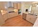 Spacious eat-in kitchen with wood floors, stainless steel appliances and granite countertops at 1126 Falling River Walk, Rocky Mount, NC 27804