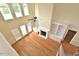 Bright living room featuring a fireplace, built-in shelving, and multiple windows at 1126 Falling River Walk, Rocky Mount, NC 27804