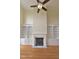 Spacious living room featuring a fireplace and built-in shelving units at 1126 Falling River Walk, Rocky Mount, NC 27804