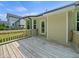 The back deck offers an outdoor space for relaxing and enjoying views of the yard at 115 Snowy Orchid Ln, Smithfield, NC 27577