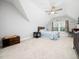 Spacious bedroom with a ceiling fan, large window, and soft carpet flooring that creates a comfortable retreat at 1176 Sagamore Dr, Louisburg, NC 27549