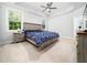 Spacious main bedroom features trey ceiling, large windows, and neutral decor at 1176 Sagamore Dr, Louisburg, NC 27549