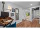 Home office featuring a stylish desk, unique decor, and wood-look flooring at 1205 Willow Dr, Chapel Hill, NC 27517
