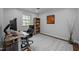 Contemporary home office with a modern desk, comfy chair, and minimalist decor at 1205 Willow Dr, Chapel Hill, NC 27517