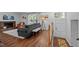Cozy living room features a comfortable sofa, natural light, and a fireplace, perfect for relaxation and entertaining at 1205 Willow Dr, Chapel Hill, NC 27517