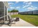 Spacious backyard with outdoor seating and fire pit at 123 Teaser Dr, Fuquay Varina, NC 27526