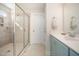 Bathroom featuring a glass shower, single sink vanity, and neutral flooring at 123 Teaser Dr, Fuquay Varina, NC 27526