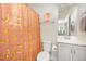 Cozy bathroom with a toilet, sink, and stylish shower curtain with cheetah print at 123 Teaser Dr, Fuquay Varina, NC 27526