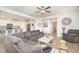 Spacious living room with an open layout, connecting to the kitchen and featuring comfortable seating at 123 Teaser Dr, Fuquay Varina, NC 27526