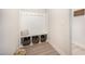 Mudroom with coat hooks, a bench, and storage for shoes and other items at 123 Teaser Dr, Fuquay Varina, NC 27526