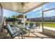 A well-equipped outdoor patio with outdoor seating and view of a spacious backyard at 123 Teaser Dr, Fuquay Varina, NC 27526