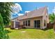 Home exterior featuring a yard with an exterior shed, patio, and lawn at 1320 Cozy Oak Ave, Cary, NC 27519
