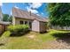 Backyard features a shed, lawn, and established landscaping at 1320 Cozy Oak Ave, Cary, NC 27519