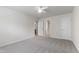 Spacious bedroom features neutral carpet, ceiling fan, and multiple closets at 1320 Cozy Oak Ave, Cary, NC 27519