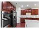 Modern kitchen featuring stainless steel appliances and plenty of cabinet space at 1320 Cozy Oak Ave, Cary, NC 27519