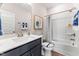 Clean bathroom featuring a modern vanity, a tub with shower, and stylish decor at 1501 Village Hall Ln # 38, Wake Forest, NC 27587